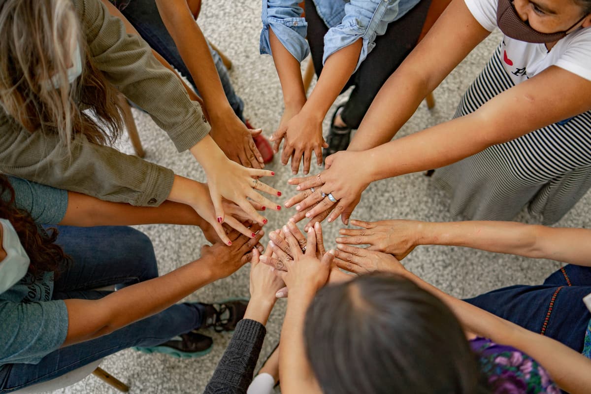 Social sector hands together